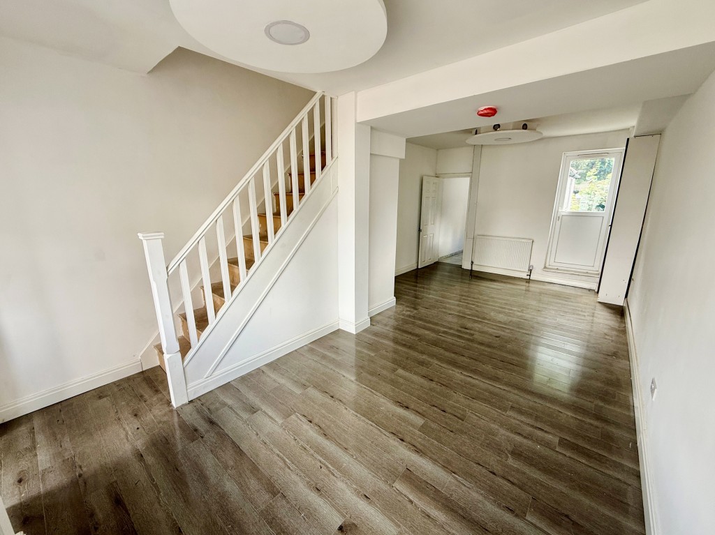 Lot: 112 - REFURBISHED TWO-BEDROOM HOUSE - Living/dining room